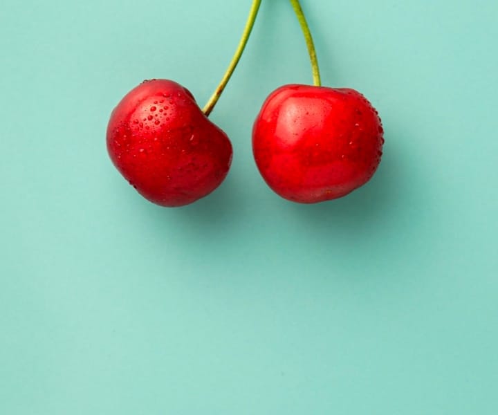 cherry on a green background