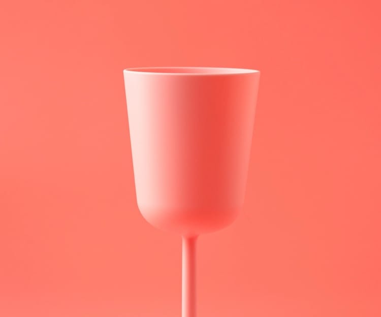 glass on pink background